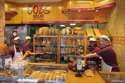 @westendbia: “The baking team at @COBSBread on Davie Street was